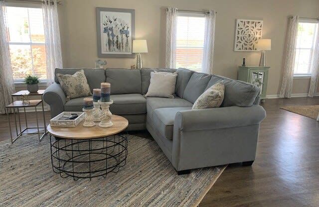 a living room with a couch and a coffee table