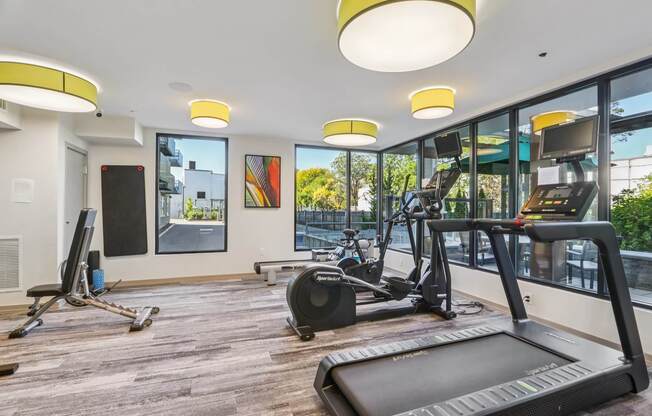 Spacious gym with treadmills at Park77 Apartments, Cambridge