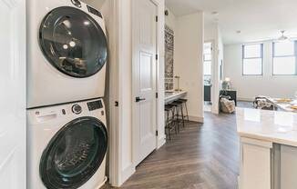 Full-size front-loading washer and dryer.