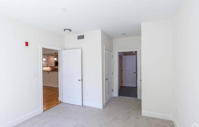 Spacious bedrooms with a carpeted floor at 7 Cameron Apartments, Cambridge 02140