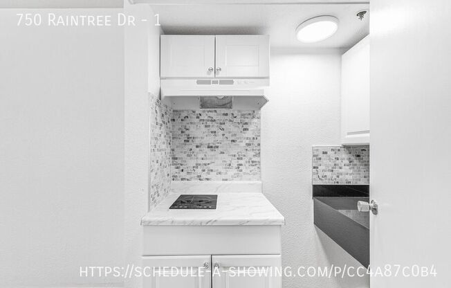 750 RAINTREE DR