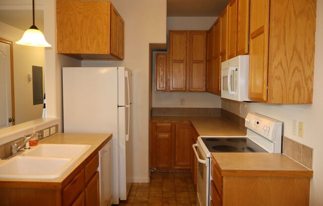 Enjoy Windsor Living: Bright Condo Near Trails, Shops & Dining
