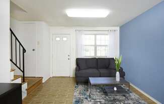 Large living room with lots of natural light  at Kingston Townhomes, Baltimore, MD