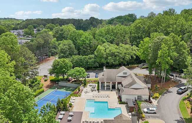 A pool and tennis court