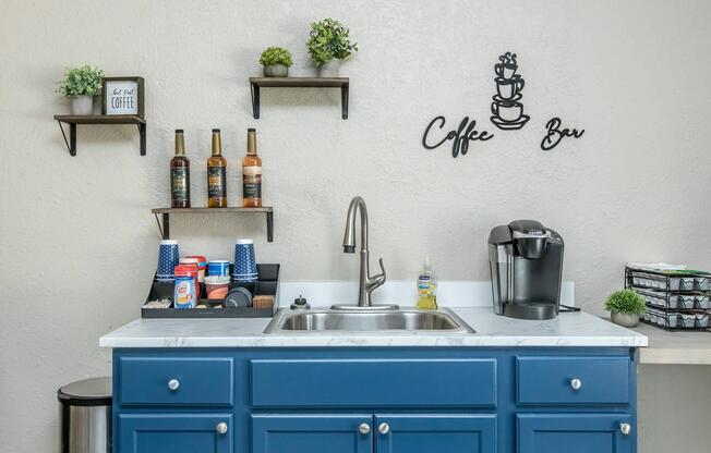 a kitchen with a stove and a sink