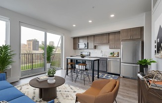 Large open concept kitchen with brown cabinets and stainless steel appliances