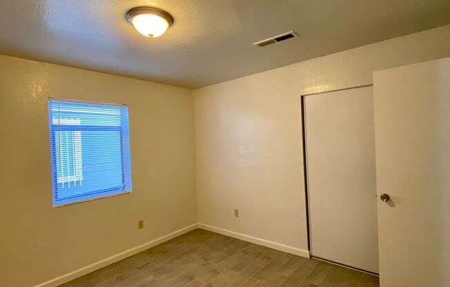 3 bedroom unit with private laundry. 2 OFF STREET PARKING SPOTS!