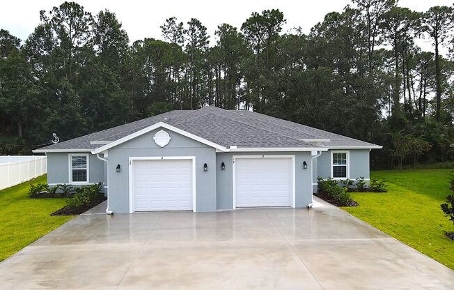 NEW Roomy 3 Bed 2 Bath Duplex Home on a Cul De Sac in Palm Coast FL!