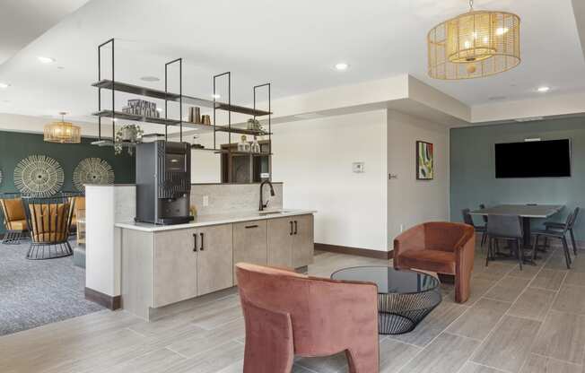 a resident clubhouse with a kitchen and dining area