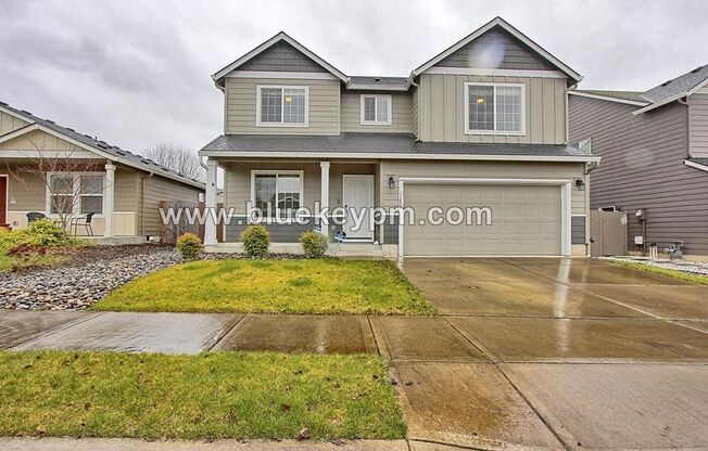 4 Bed, 2.5 Bath with Office/Den and 2 Car Garage in Orchards Fountain Village