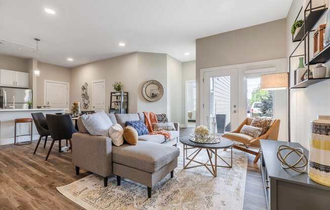 The Airdrie at Paoli Station spacious living room with balcony entrance