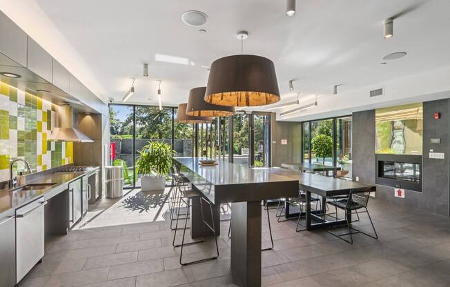 Modern kitchen with a dining table and chairs at Park77 Apartments, Cambridge, Massachusetts, 02138