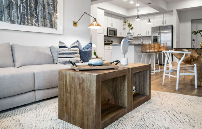 a living room with a couch and a table