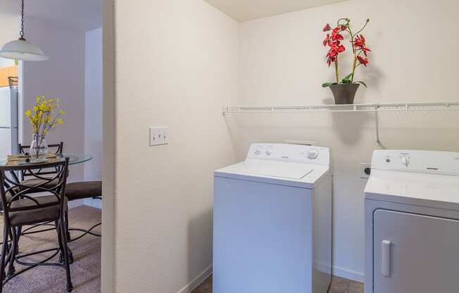Desert Sands laundry room with standard washer and dryer. 