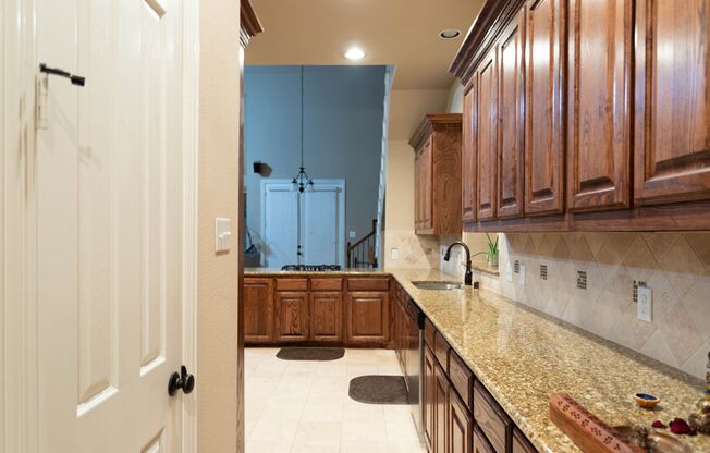 Very beautiful 5 bedroom, 4.1 bathroom house. It has 6 living areas, 2 dining areas. Hardwood floors with carpets upstairs.