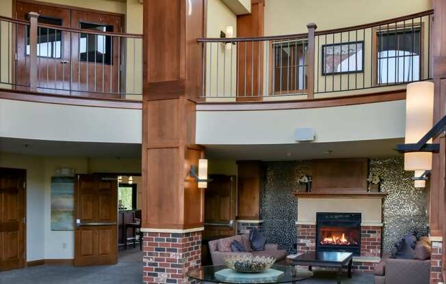 updated lobby with beautiful staircase and fireplace