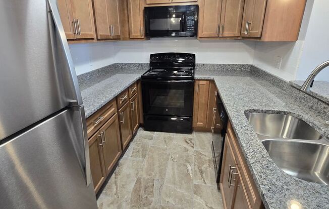 Beautifully renovated TWO-bedroom Condo on third floor with charm.