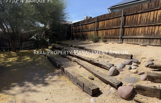 7752 N BARQUE PL