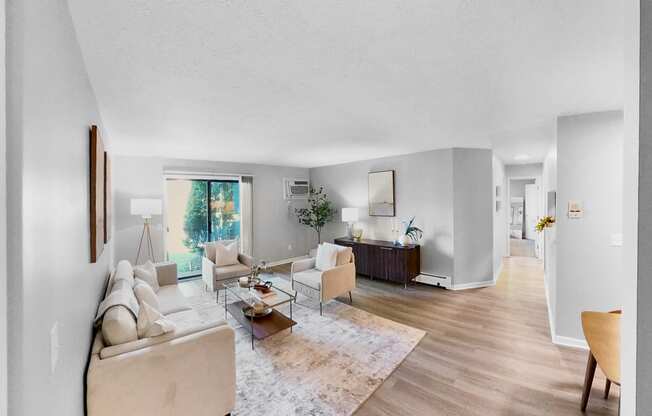 a living room with two couches and a table