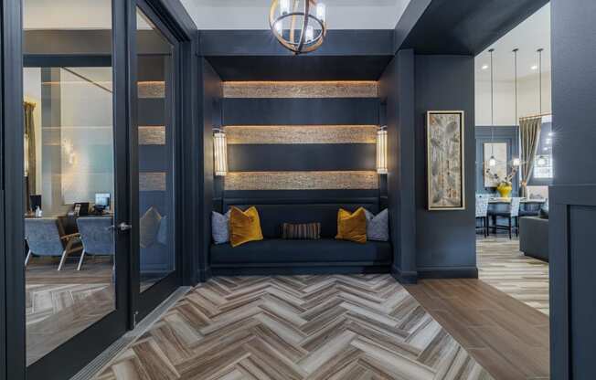 a living room with a couch and a checkered floor