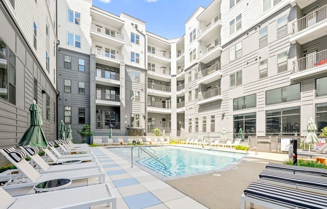 Alton Mill District Apartments in Charlotte, North Carolina Pool with Lounge Chairs