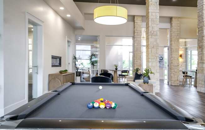 social area with billiards at The Allure apartments