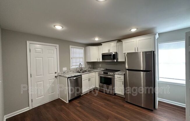 1024 W 39 ST