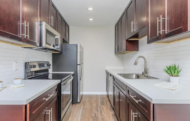 a modern kitchen with stainless steel appliances