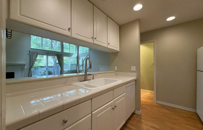 Bright Cedar Mill Townhome-Style Home with Vaulted Living Room, Skylight, Garage & Modern Kitchen