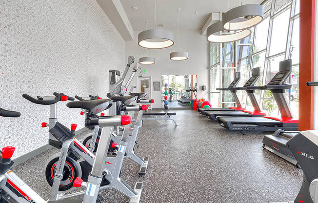 Fully equipped 24 hour fitness center at Astro Apartments, Seattle, Washington