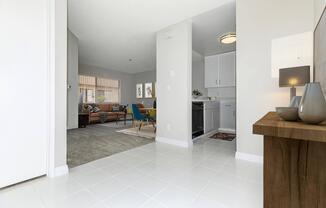 a kitchen with a tile floor