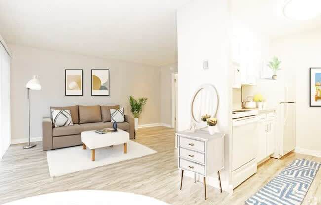 A living room with a couch, a coffee table, and a lamp.