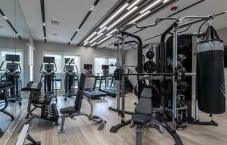 a gym with weights machines and other exercise equipment