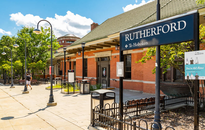 A sign that says Rutherford is on a pole at Vermella Lyndhurst apartments, Lyndhurst, NJ, 07071