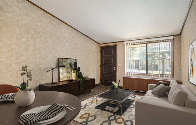 a living room with a couch and a coffee table