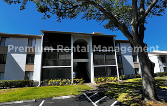 1 Bedroom 2nd Floor Condo in East Orlando with Laminate Flooring and Scenic Balcony View!