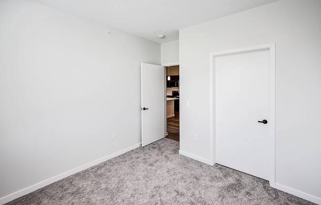 Studio, one two and three bedroom apartments and townhomes featuring open concept floor plans, dens, large windows, stainless steel appliances, quartz countertops, eat-in kitchens, pantries, LVT flooring and much more at The Trails at North Streams in Omaha, NE