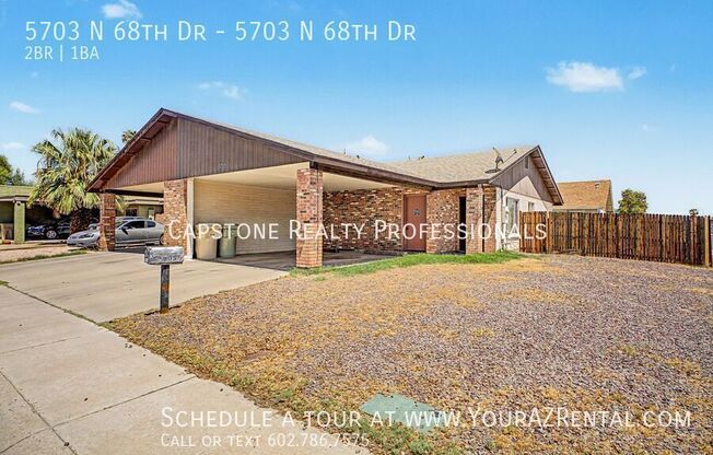 5703 N 68 DR
