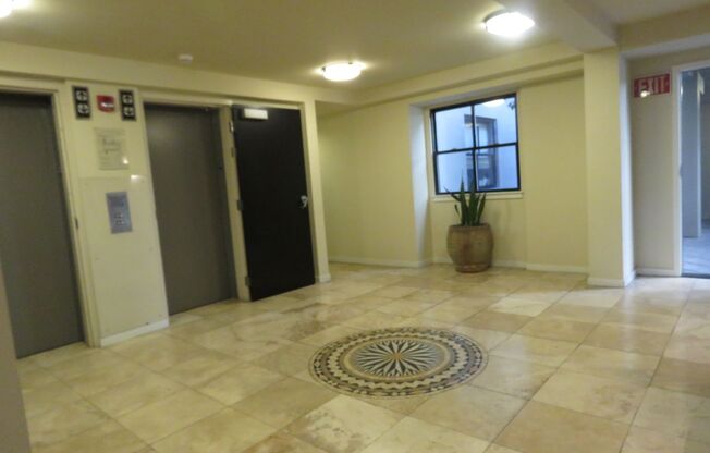 2 BEDROOM CONDO IN HIGHLY DESIRABLE AREA W/ PARKING