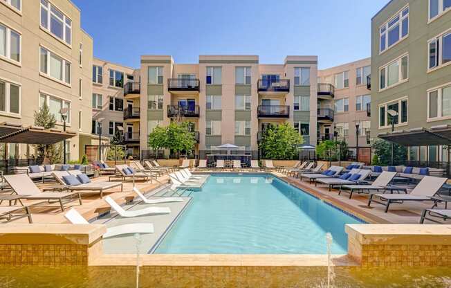 our apartments have a large swimming pool with lounge chairs