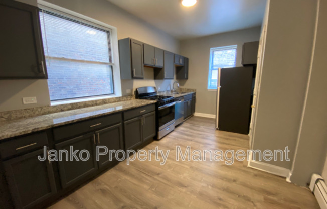 5647 W Washington Blvd