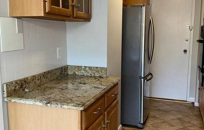 Luxury 2-bedroom 2-bath condo in Grosvenor Park with 1 reserved garage parking space.