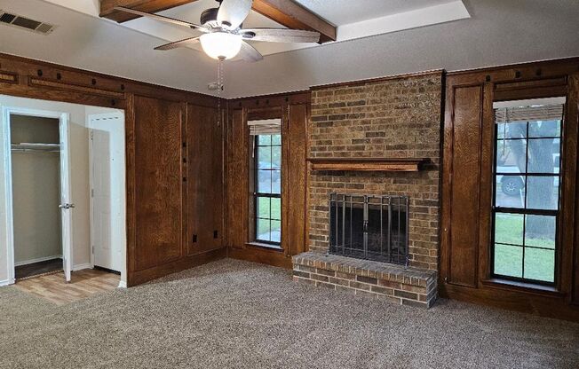 Three bedroom and two bathroom nicely remodeled with new flooring. Large wood fenced backyard