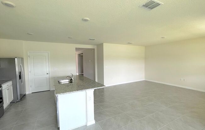 Like New 3/2 Home w/Garage and waterview in Summerly of Saint Cloud and minutes from Lake Nona