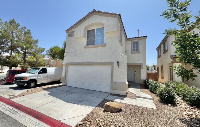 THIS IS A CHARMING TWO-STORY NORTH LAS VEGAS HOME WITH 2 BEDROOMS, 2.5 BATHS AND A TWO-CAR ATTACHED GARAGE. FEATURING TILE AND CARPET FLOORING, NEUTRAL PAINT, AND BLINDS THROUGHOUT, THE MAIN LEVEL OFFERS AN OPEN LIVING AND DINING AREA THAT FLOWS INTO A KI