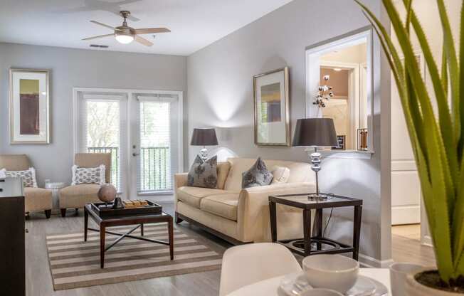 an interior view of a couch at Verano apartments