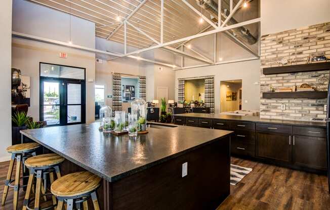 Trendy Clubhouse kitchen at Aviator at Brooks Apartments, Clear Property Management, Texas