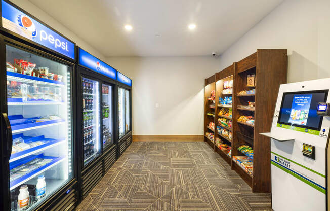 a convenience store with refrigerators and a vending machine