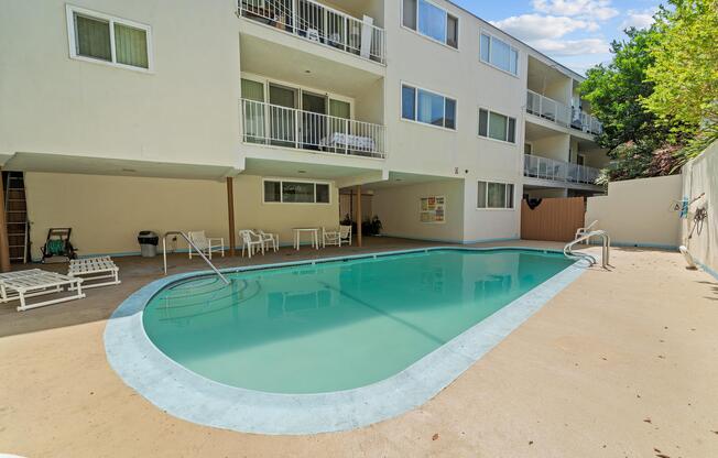 a pool next to a building