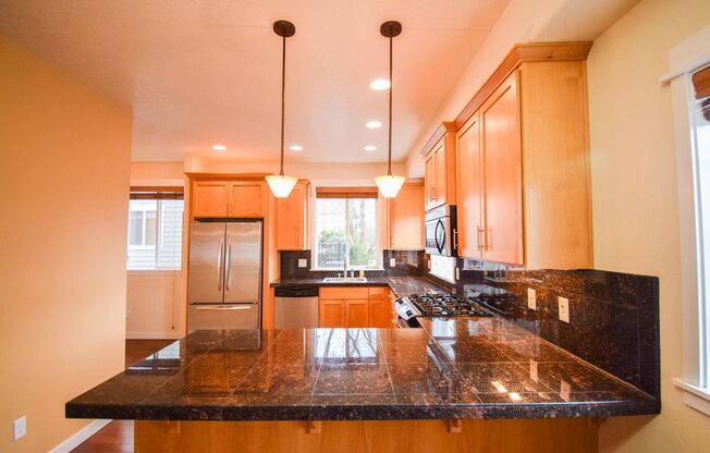 Beautiful Condo In the Heart of Beaverton! Garage included! Washer and Dryer in the home!